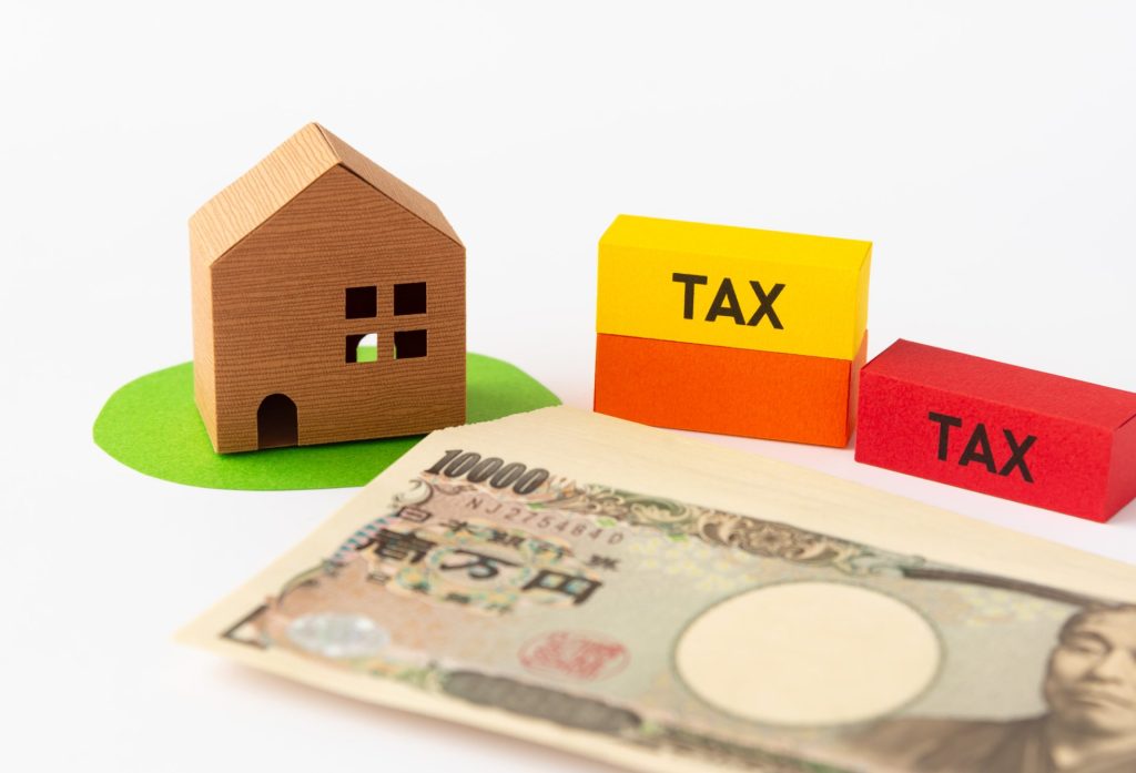 住宅の模型と税金
